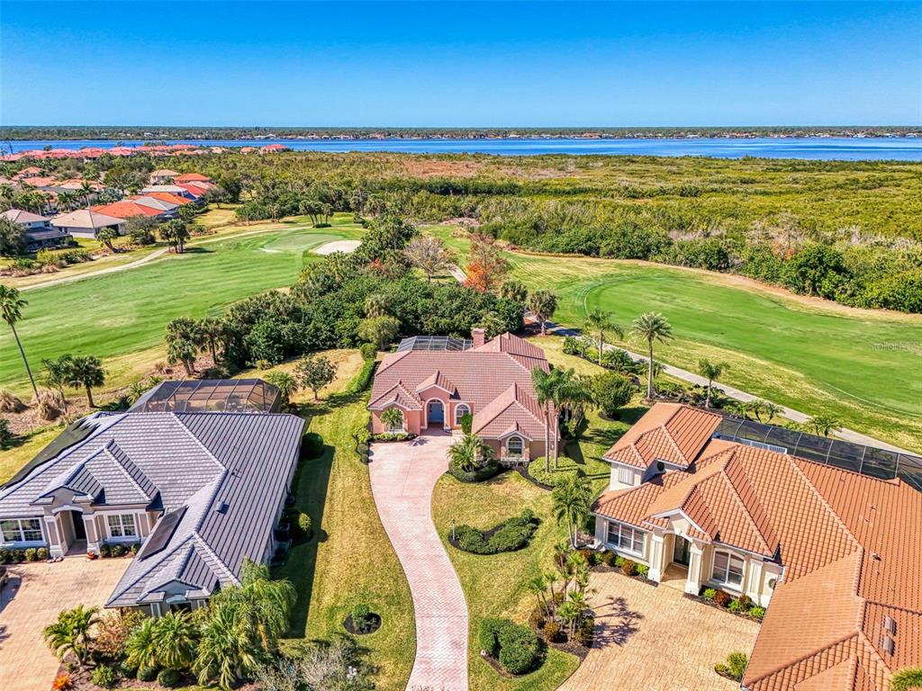 3634 Pennyroyal Road Port Charlotte, FL 33953 - Photo 63 of 91 an aerial view of residential houses with outdoor space and ocean view