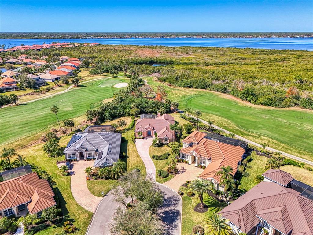 3634 Pennyroyal Road Port Charlotte, FL 33953 - Photo 64 of 91 an aerial view of residential houses with outdoor space and ocean view