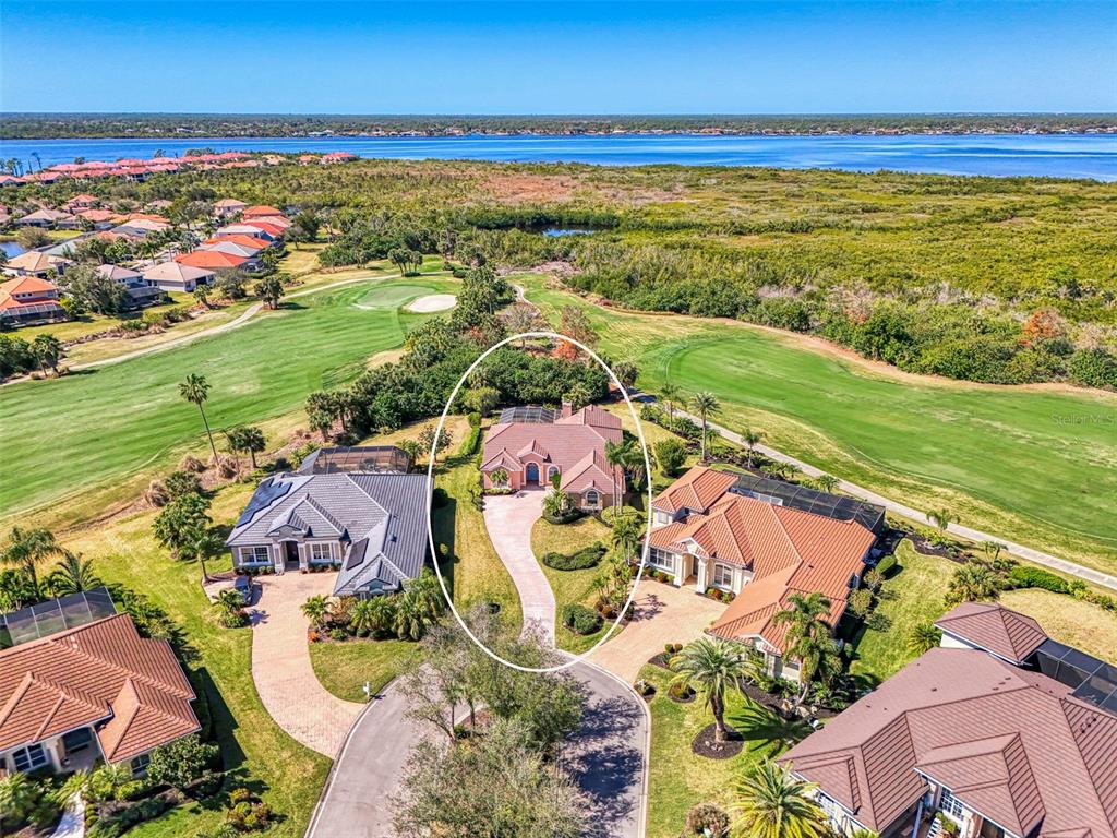 3634 Pennyroyal Road Port Charlotte, FL 33953 - Photo 65 of 91 an aerial view of residential houses with outdoor space and ocean view