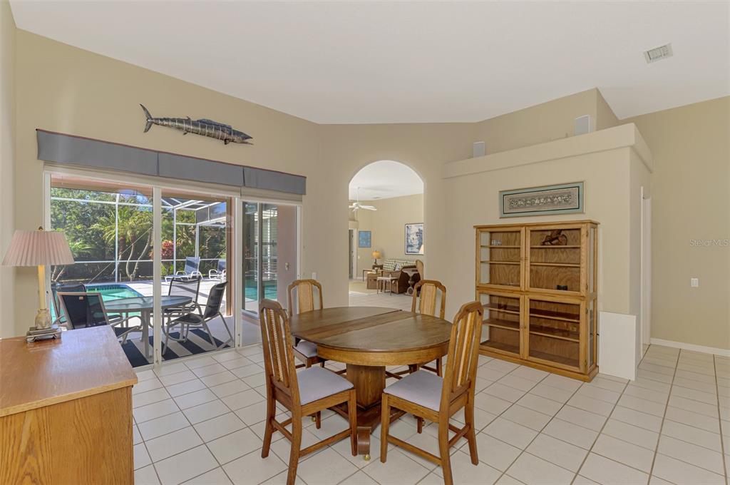 3634 Pennyroyal Road Port Charlotte, FL 33953 - Photo 9 of 91 a dining room with furniture and window