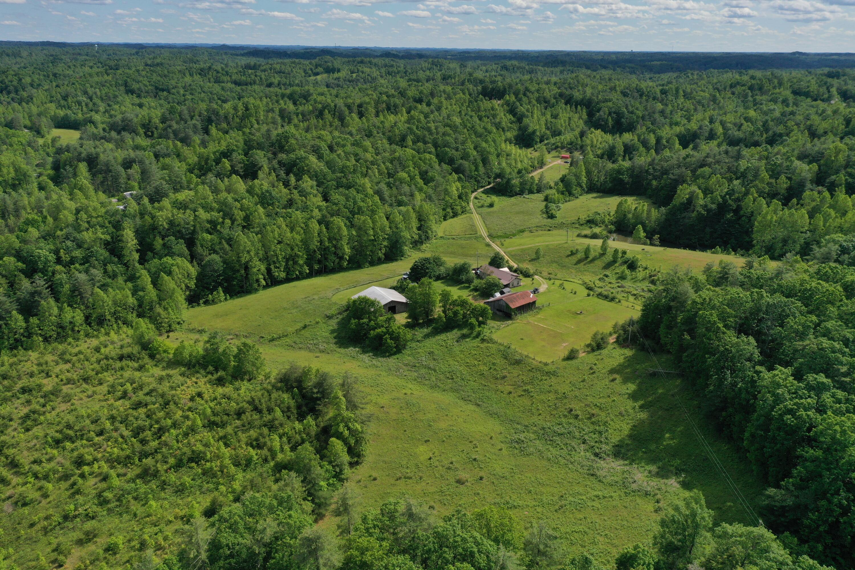 342 Dewey Banks Road Campton, KY 41301 - Photo 21 of 64 021 aerial drone shot from the northeast