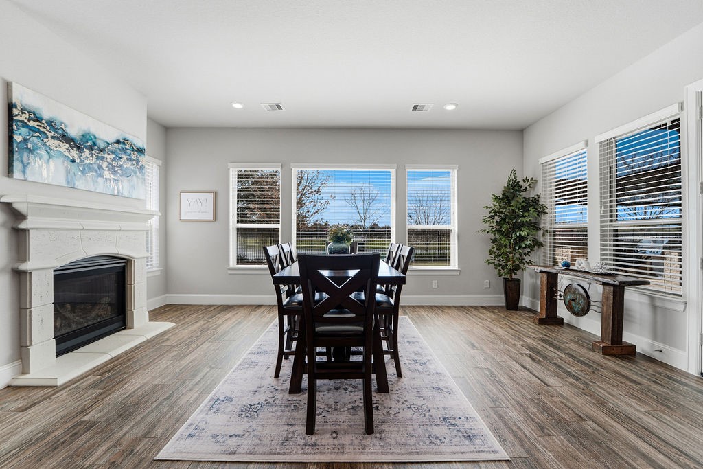 3618 Edison Lane Iowa Colony, TX 77583 - Photo 14 of 50 a view of a a dining room with furniture window and wooden floor