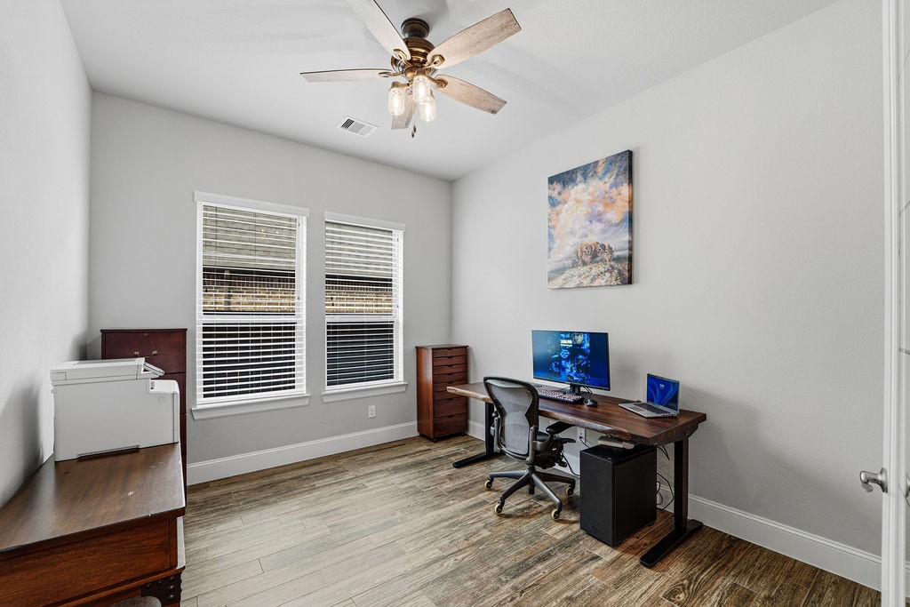 3618 Edison Lane Iowa Colony, TX 77583 - Photo 25 of 50 a view of a workspace with furniture and a window