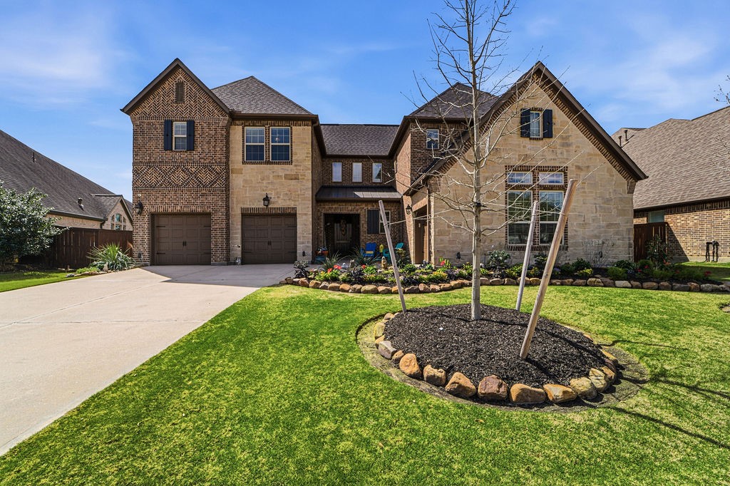 3618 Edison Lane Iowa Colony, TX 77583 - Photo 3 of 50 a front view of a house with a yard