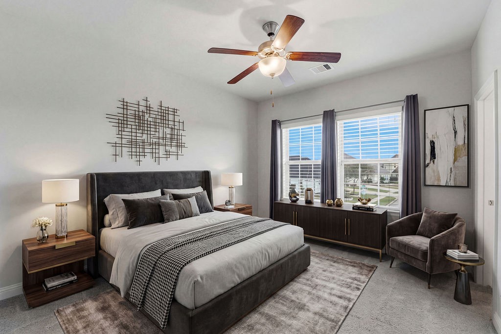 3618 Edison Lane Iowa Colony, TX 77583 - Photo 31 of 50 a bedroom with a large bed and a couch