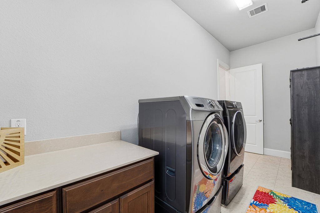 3618 Edison Lane Iowa Colony, TX 77583 - Photo 38 of 50 a utility room with dryer and washer