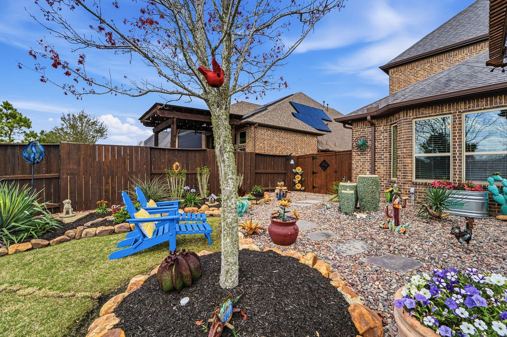 3618 Edison Lane Iowa Colony, TX 77583 - Photo 42 of 50 a view of a dinning tables and chairs in backyard of the house
