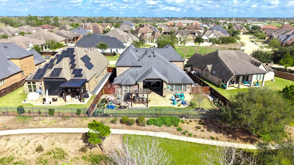 3618 Edison Lane Iowa Colony, TX 77583 - Photo 45 of 50 an aerial view of house with yard swimming pool and outdoor seating