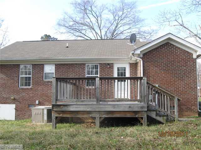 3216 Wellingford Street High Point, NC 27265 - Photo 2 of 15 Exterior Front. Back of Home with Deck