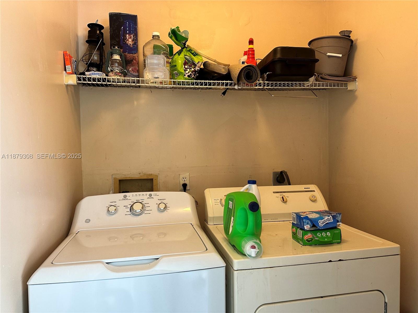 19700 Southwest 103rd Court, Unit 201 Cutler Bay, FL 33157 - Photo 21 of 21 a utility room with dryer and washer