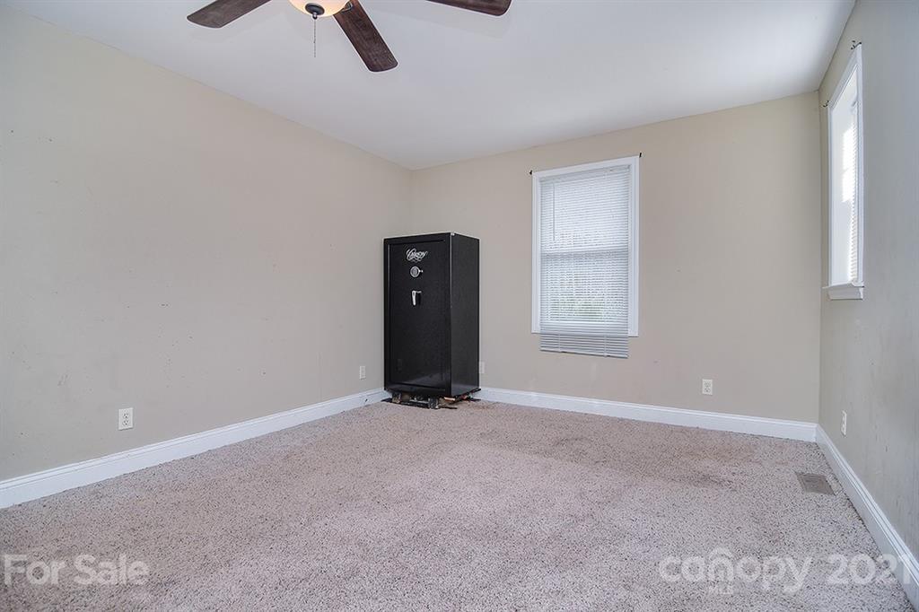 1100 Culp Street Lancaster, SC 29720 - Photo 17 of 30 an empty room with closet and windows