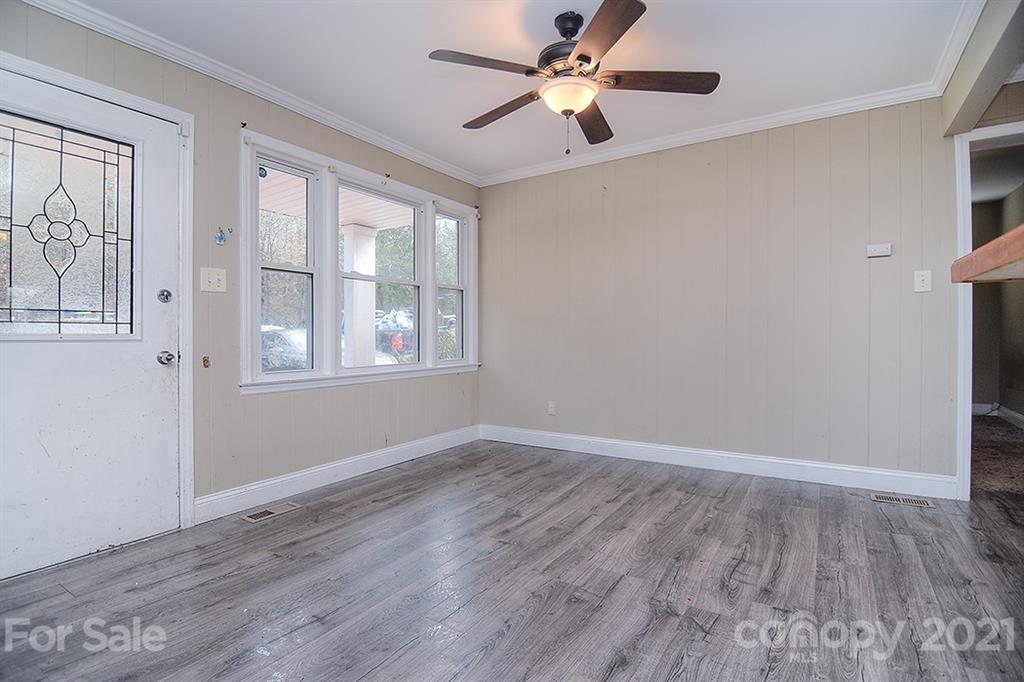 1100 Culp Street Lancaster, SC 29720 - Photo 5 of 30 wooden floor in an empty room with a window
