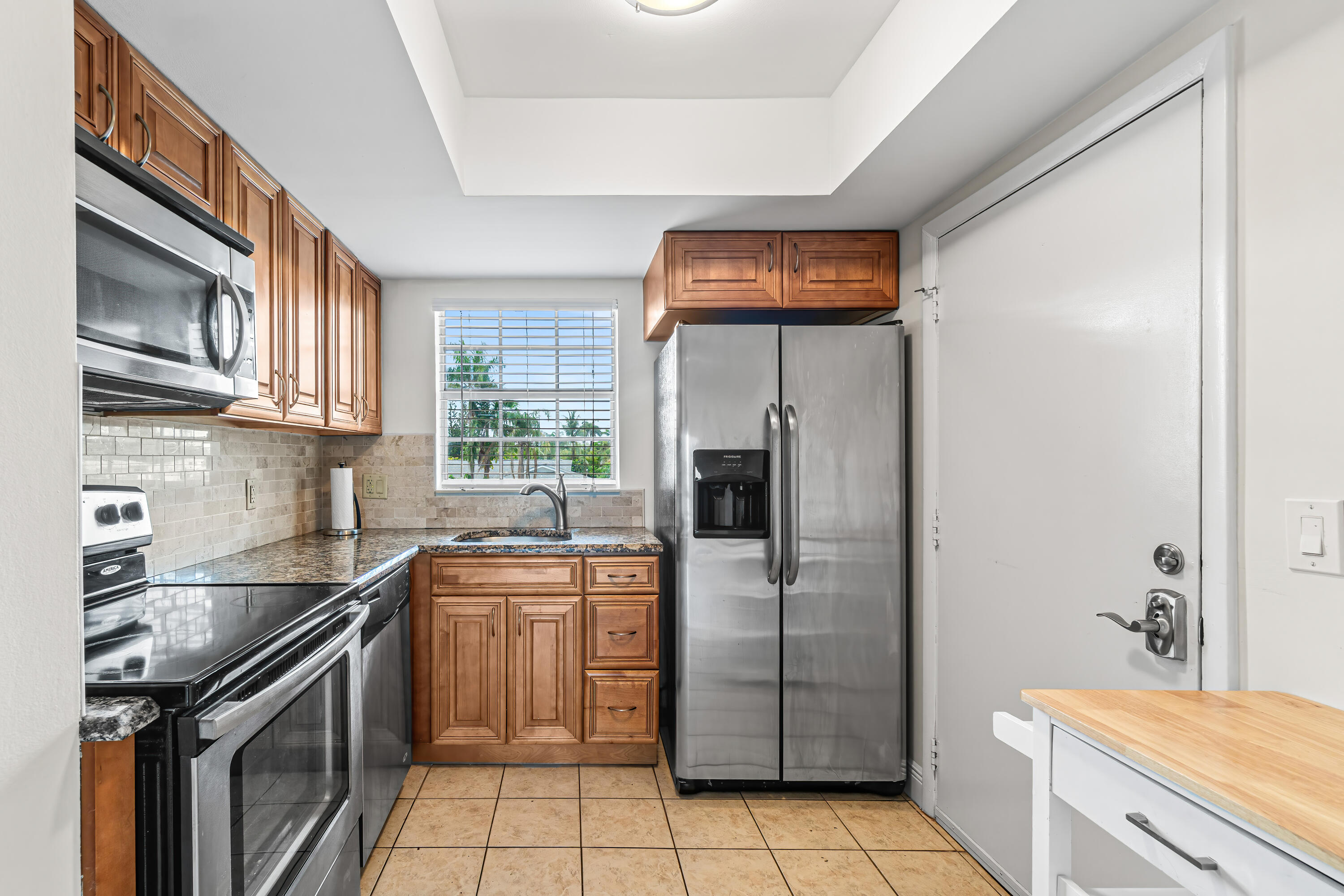 410 Wilma Circle, Unit 203 Riviera Beach, FL 33404 - Photo 2 of 36 005-410WilmaCircle-203-RivieraBeach-FL-3