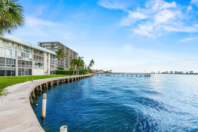 a view of a swimming pool with a lounge chairs