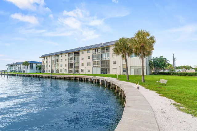 a view of swimming pool with outdoor seating