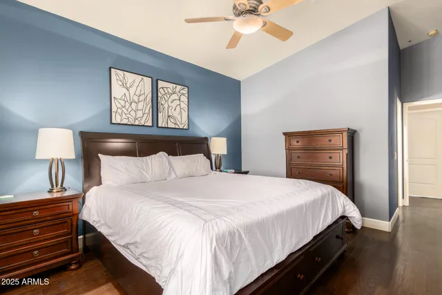 a bedroom with bed and window