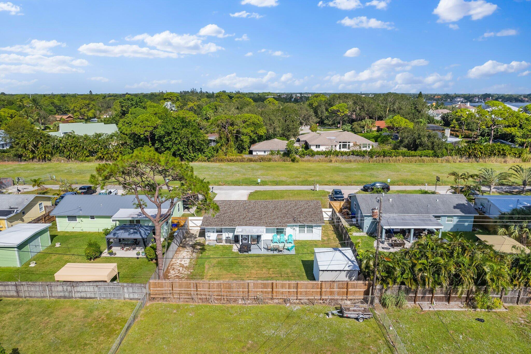 5810 Tucker Road Jupiter, FL 33458 - Photo 27 of 51 a view of a city with lawn chairs