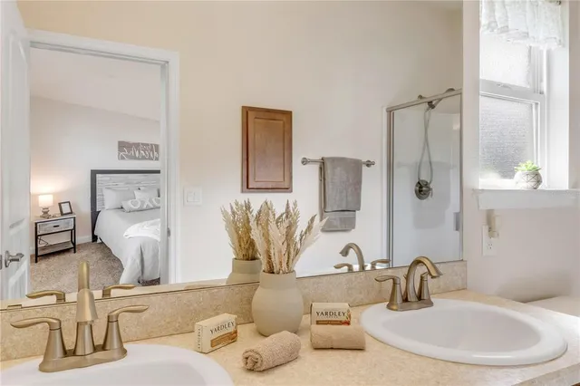 a bathroom with a sink and a mirror