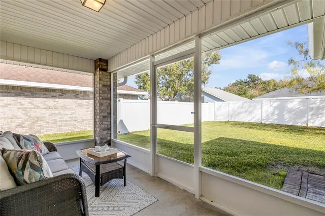 a view of swimming pool with outdoor seating