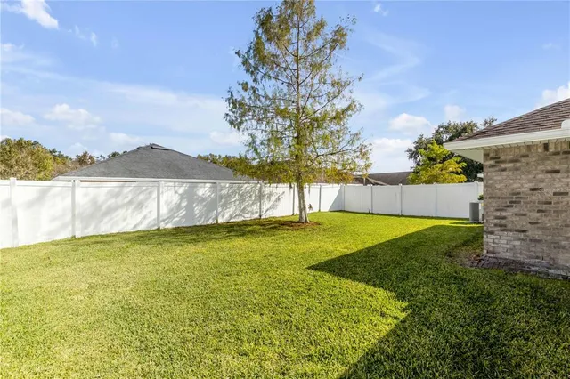 a view of outdoor space and yard