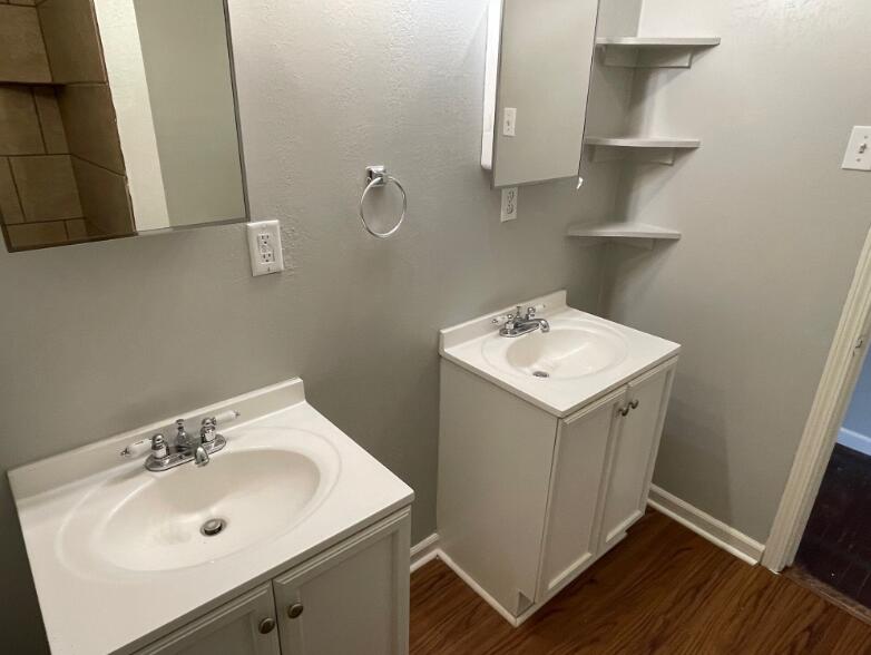 2607 27th Street Lubbock, TX 79410 - Photo 11 of 13 a utility room with sink dryer and washer