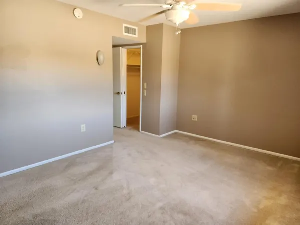 an empty room with a bathroom