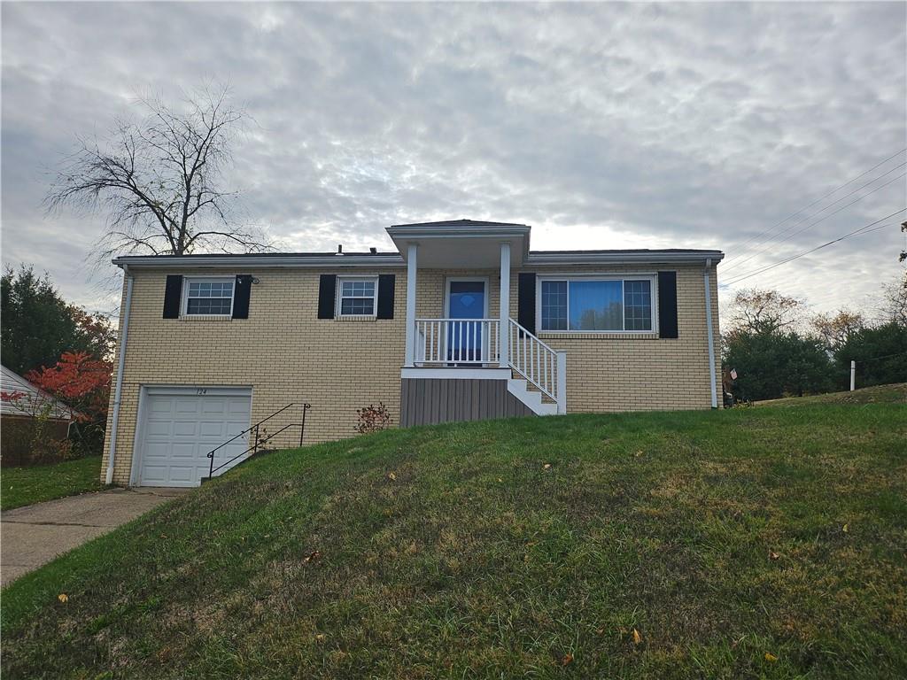 124 Clover Drive Monaca, PA 15061 - Photo 2 of 14 a front view of house with yard and green space