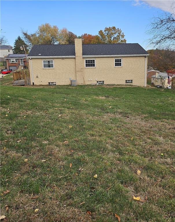 124 Clover Drive Monaca, PA 15061 - Photo 3 of 14 a view of a house with a yard