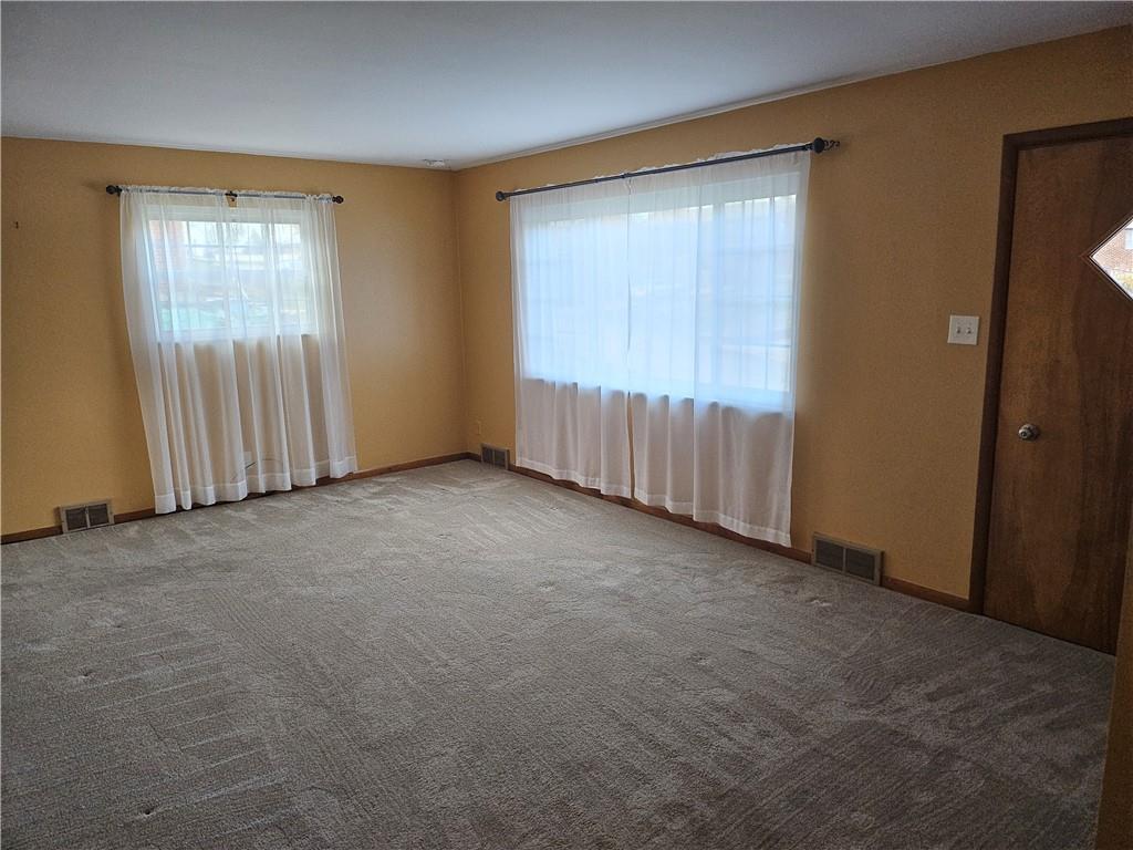 124 Clover Drive Monaca, PA 15061 - Photo 8 of 14 an empty room with windows