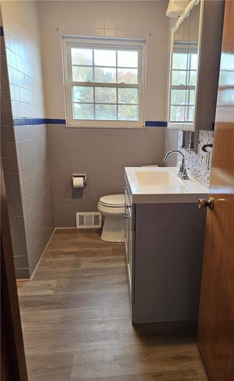 124 Clover Drive Monaca, PA 15061 - Photo 9 of 14 a room with a window wooden floor and a sink