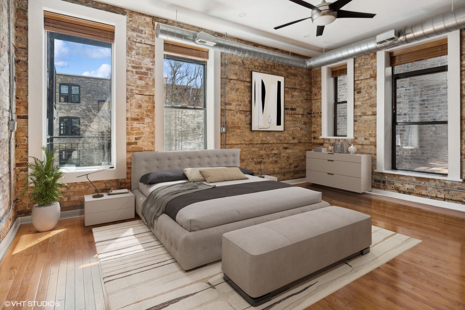 717 West Briar Place, Unit 2W Chicago, IL 60657 - Photo 19 of 26 a bedroom with furniture and a large window