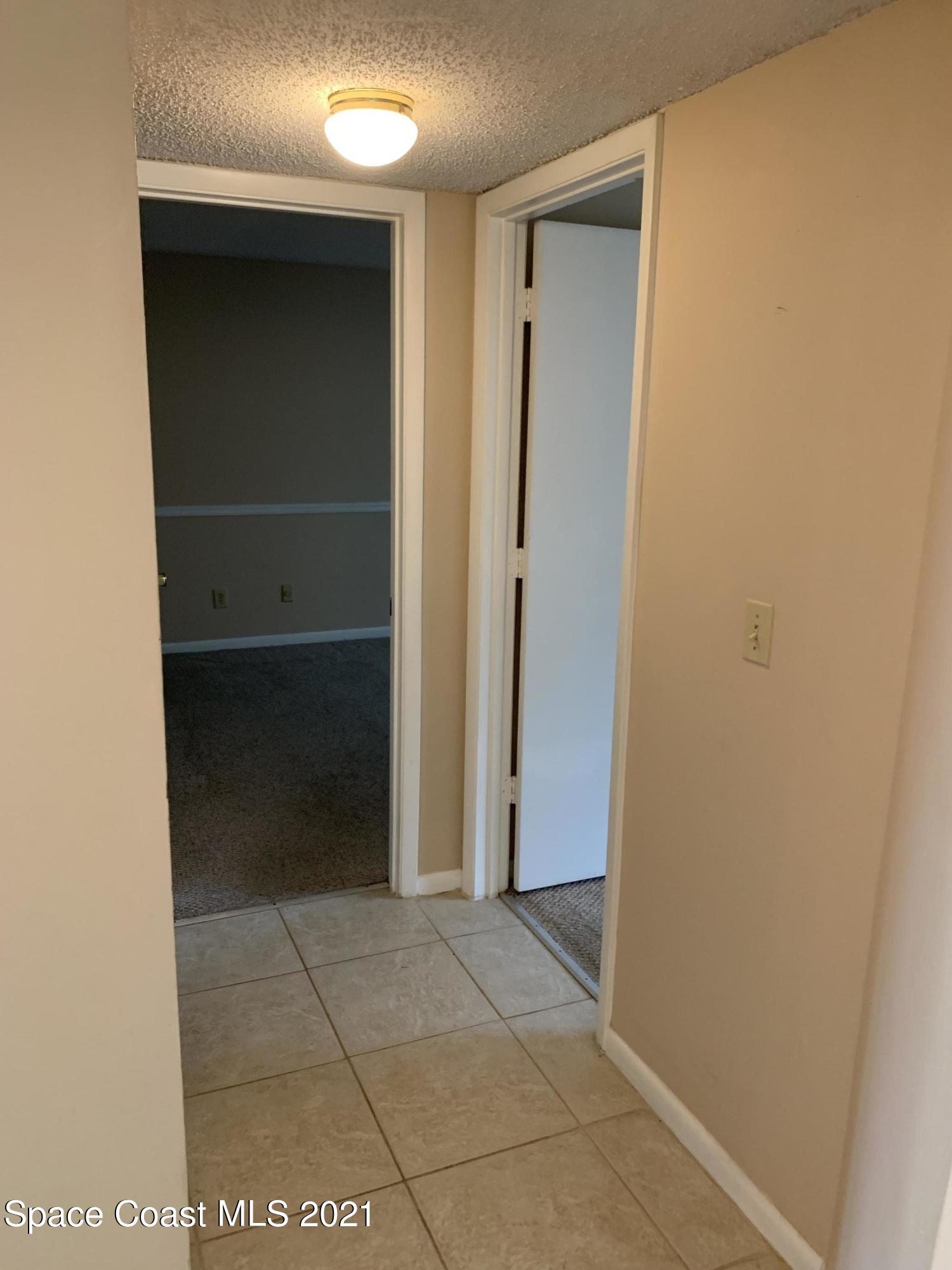 584 North Wickham Road, Unit 86 Melbourne, FL 32935 - Photo 8 of 12 a view of an empty room