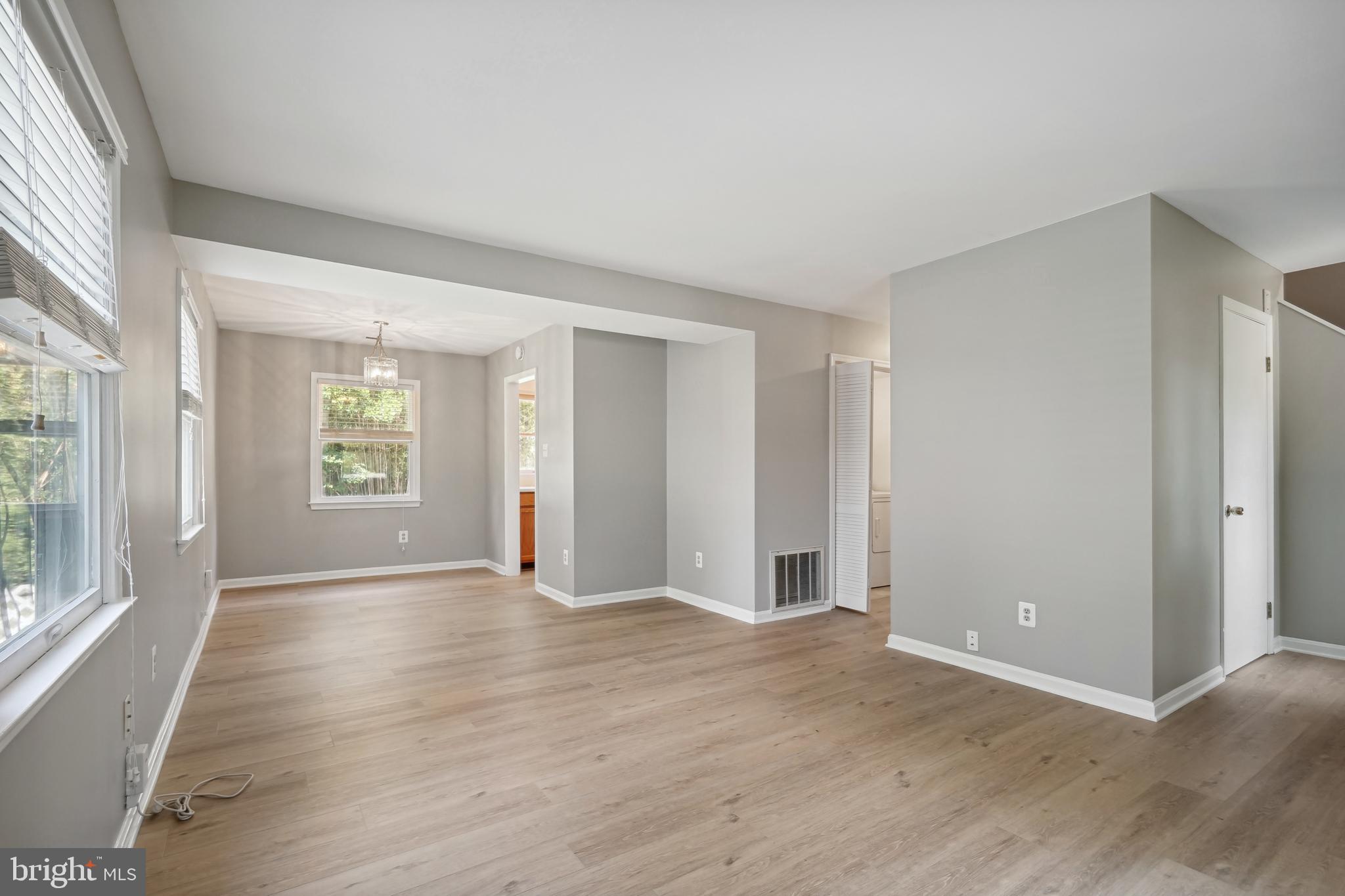 2023 Griffith Road Falls Church, VA 22043 - Photo 10 of 23 Living and dining room with kitchen in background
