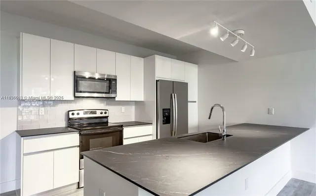 a view of swimming pool from a balcony