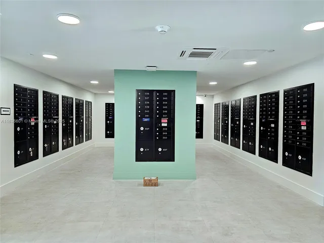 a view of a patio with a table and chairs