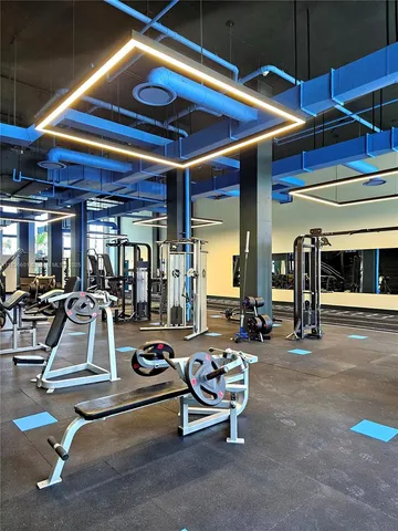 a swimming pool with outdoor seating