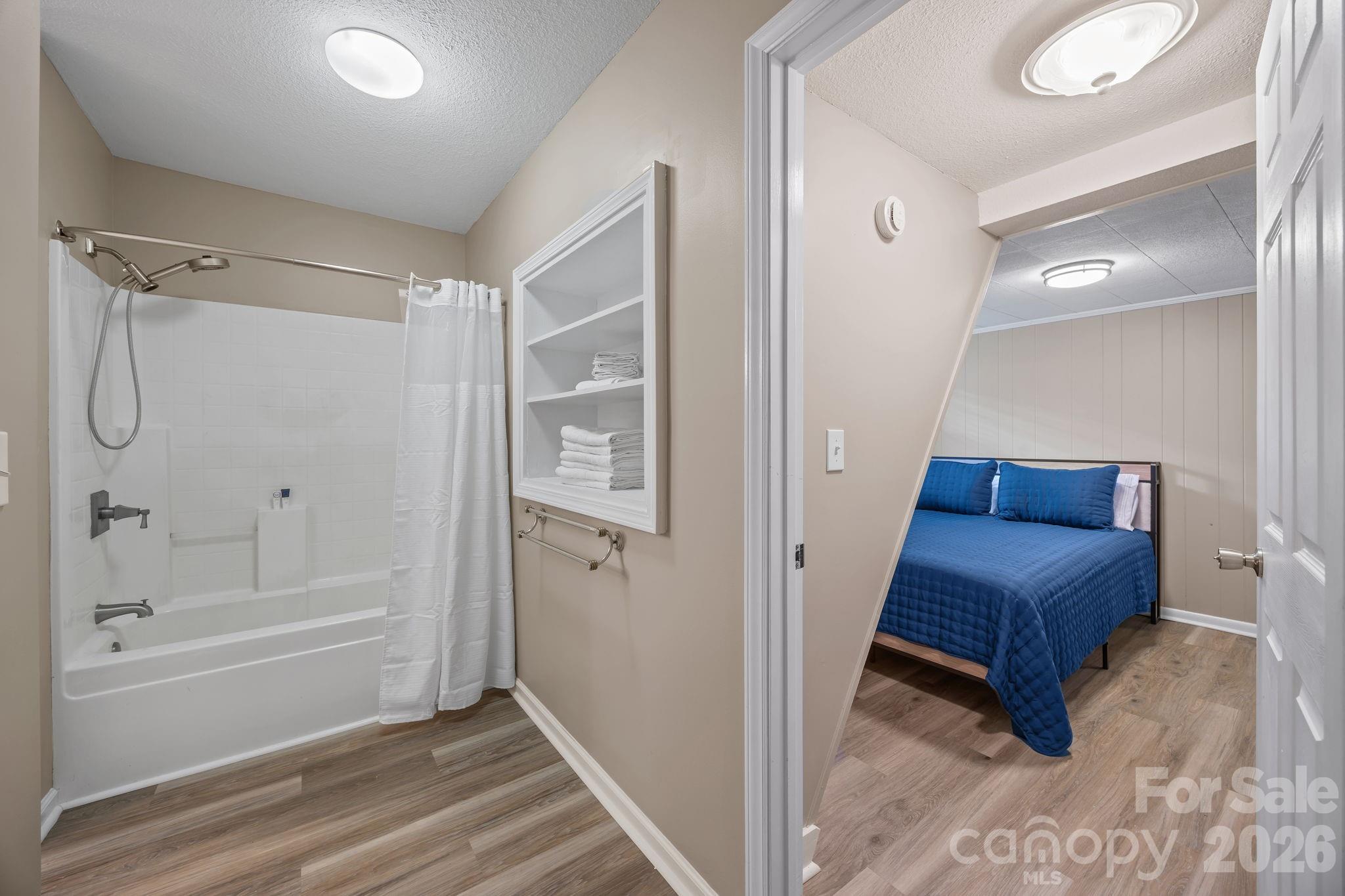 1870 Scout Road Salisbury, NC 28146 - Photo 34 of 48 a bathroom with a tub and a shower