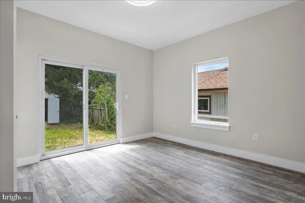 a balcony with view of swimming pool