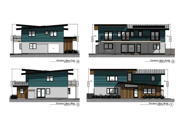 a view of living room that has a fireplace and a table