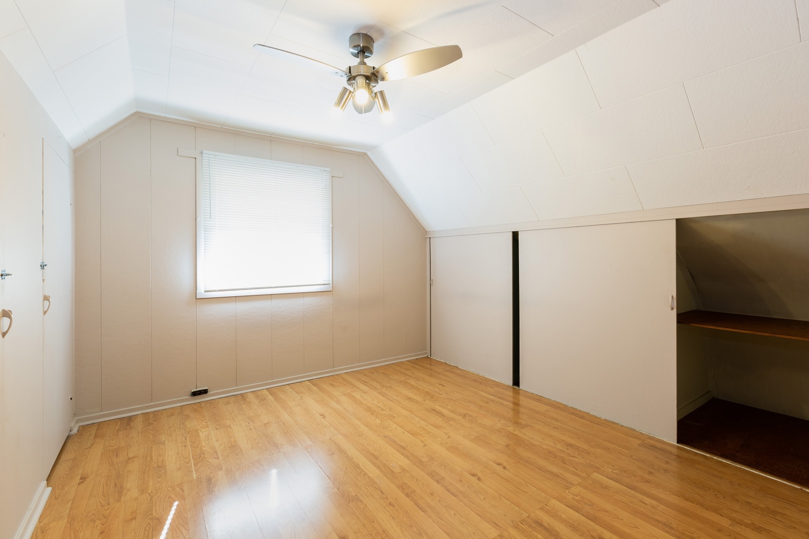 446 Golf Road Crystal Lake, IL 60014 - Photo 8 of 14 a view of empty room with wooden floor and fan