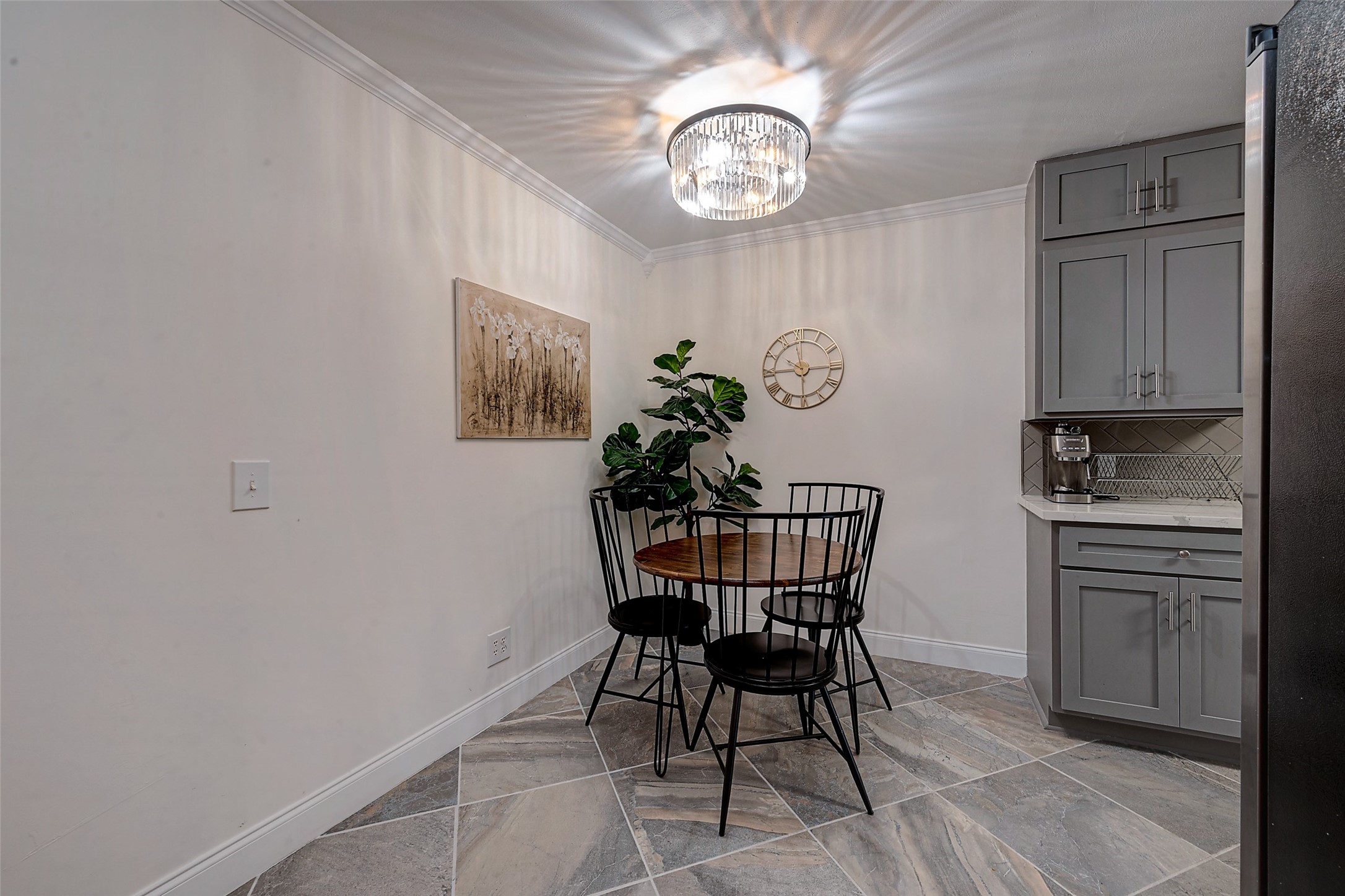 4005 Omeara Drive Houston, TX 77025 - Photo 16 of 49 a view of a dining room with furniture and chandelier