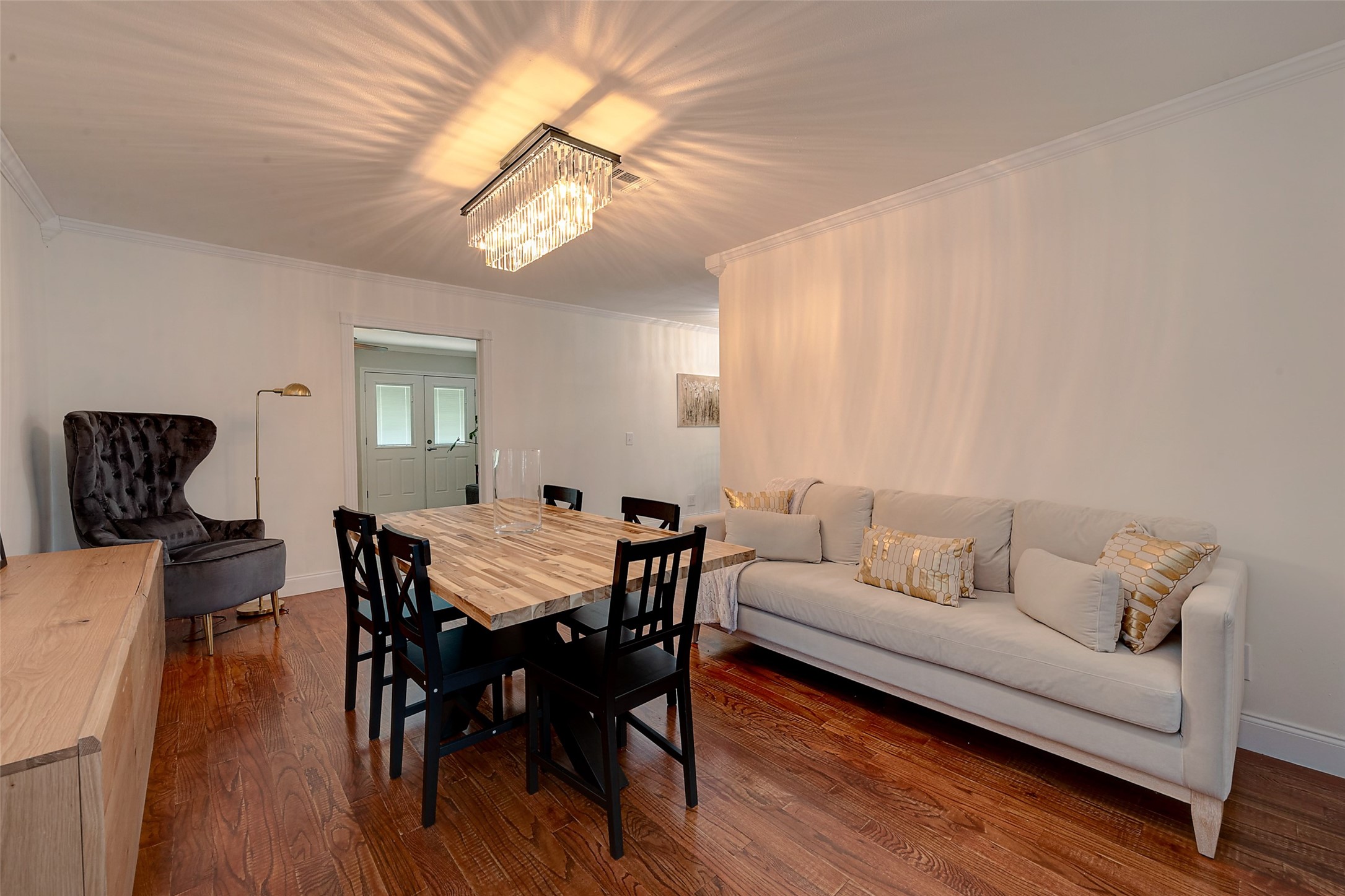 4005 Omeara Drive Houston, TX 77025 - Photo 23 of 49 a living room with furniture and a wooden floor