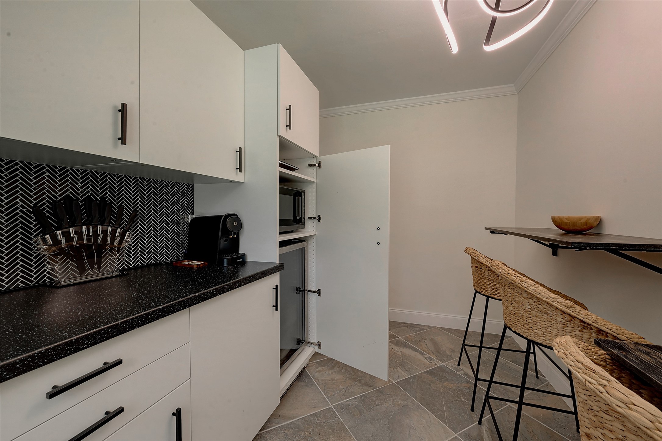4005 Omeara Drive Houston, TX 77025 - Photo 24 of 49 a kitchen with stainless steel appliances a refrigerator and a stove top oven