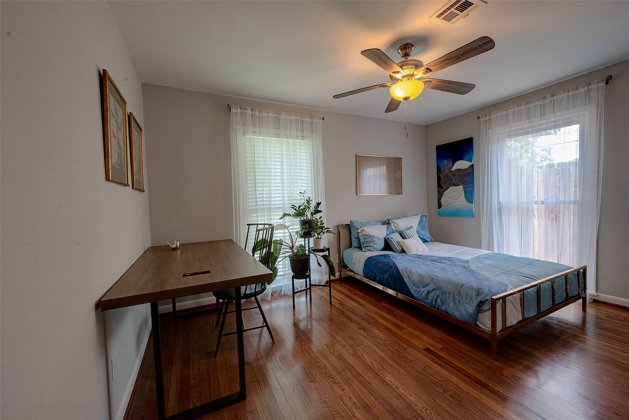 4005 Omeara Drive Houston, TX 77025 - Photo 44 of 49 a living room with a bed furniture and a window
