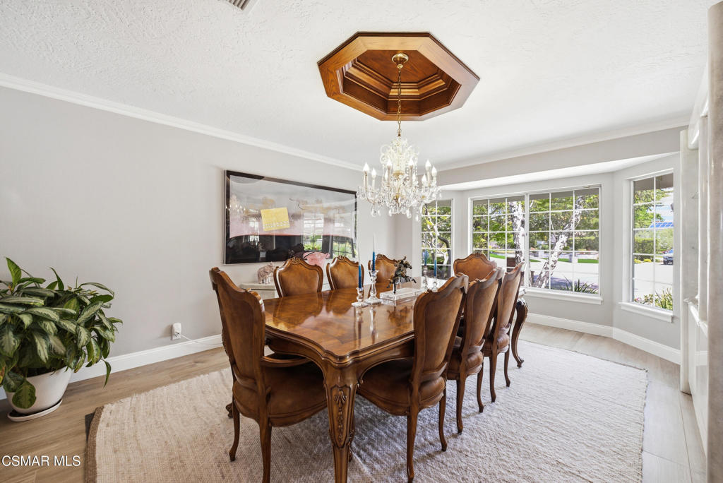 206 Rangely Court Simi Valley, CA 93065 - Photo 16 of 63 a view of a dining room with furniture window and wooden floor