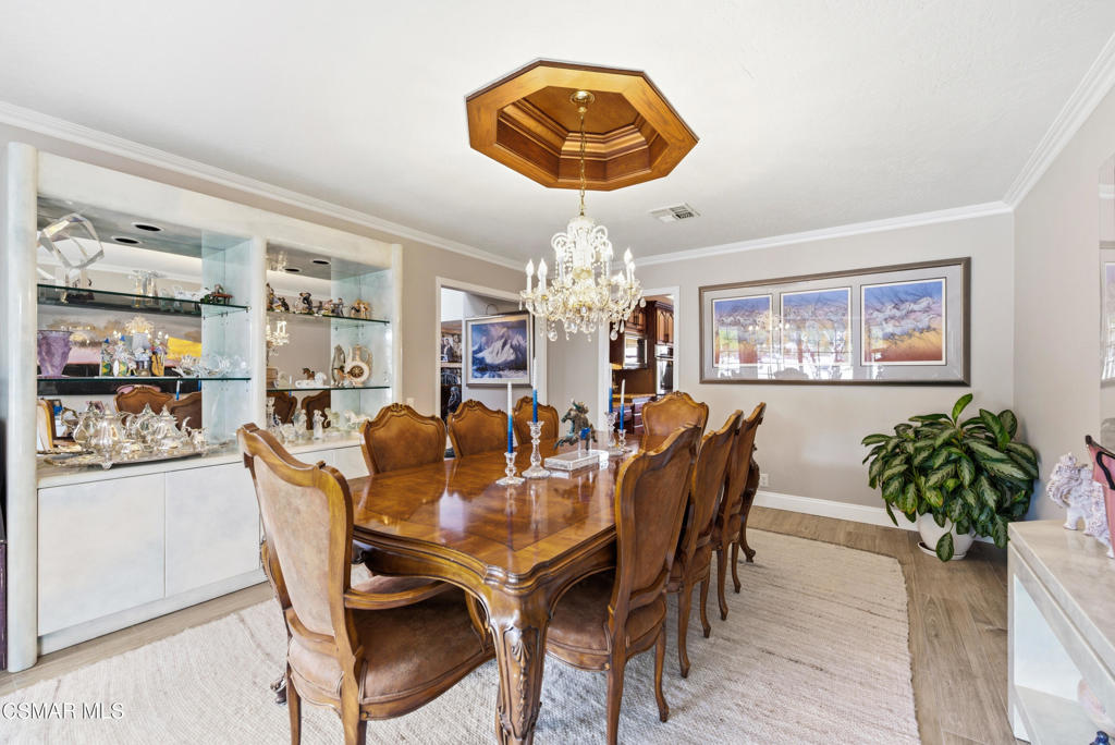 206 Rangely Court Simi Valley, CA 93065 - Photo 17 of 63 a view of a dining room with furniture window and wooden floor