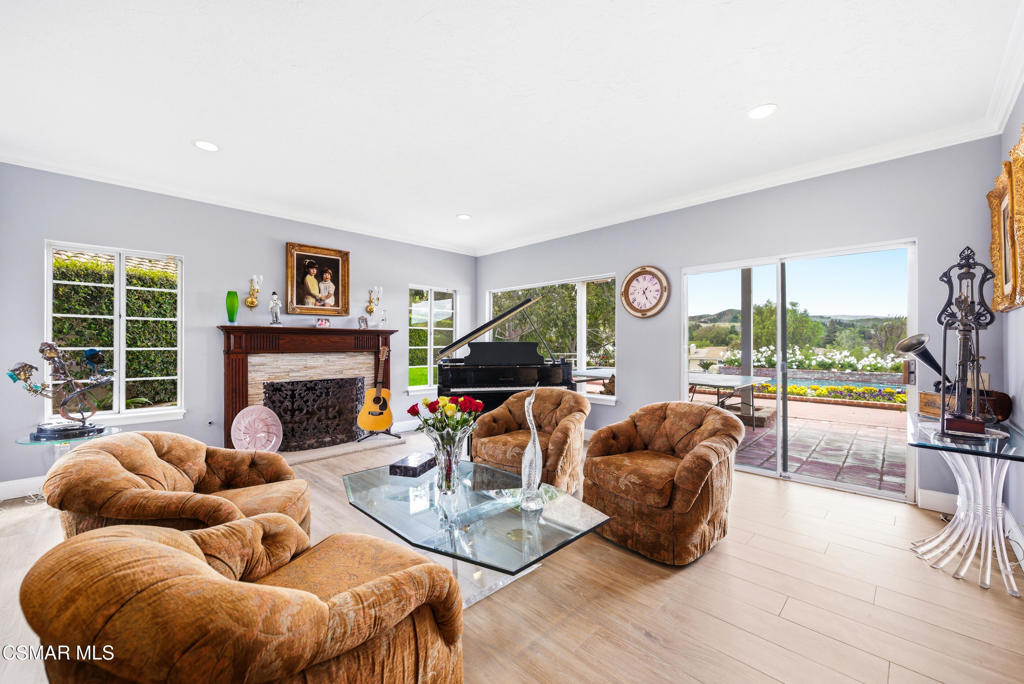 206 Rangely Court Simi Valley, CA 93065 - Photo 18 of 63 a living room with furniture and a fireplace