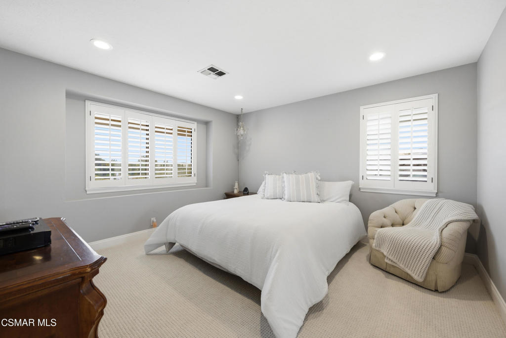 206 Rangely Court Simi Valley, CA 93065 - Photo 28 of 63 a bedroom with a bed and a window