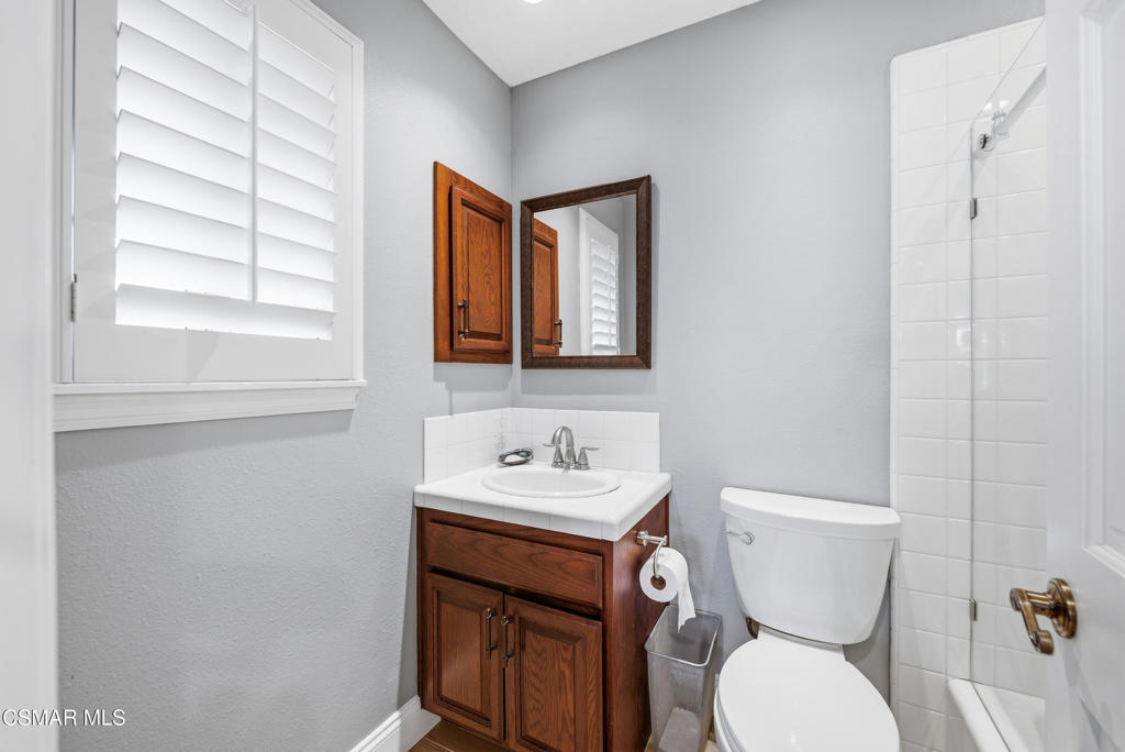 206 Rangely Court Simi Valley, CA 93065 - Photo 31 of 63 a bathroom with a toilet sink and mirror