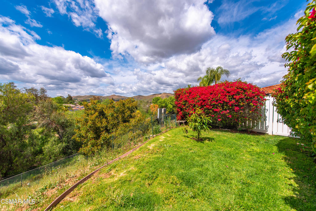 206 Rangely Court Simi Valley, CA 93065 - Photo 44 of 63 a view of a pathway with a yard